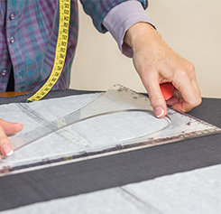 Dressmaker Drawing a Design Pattern